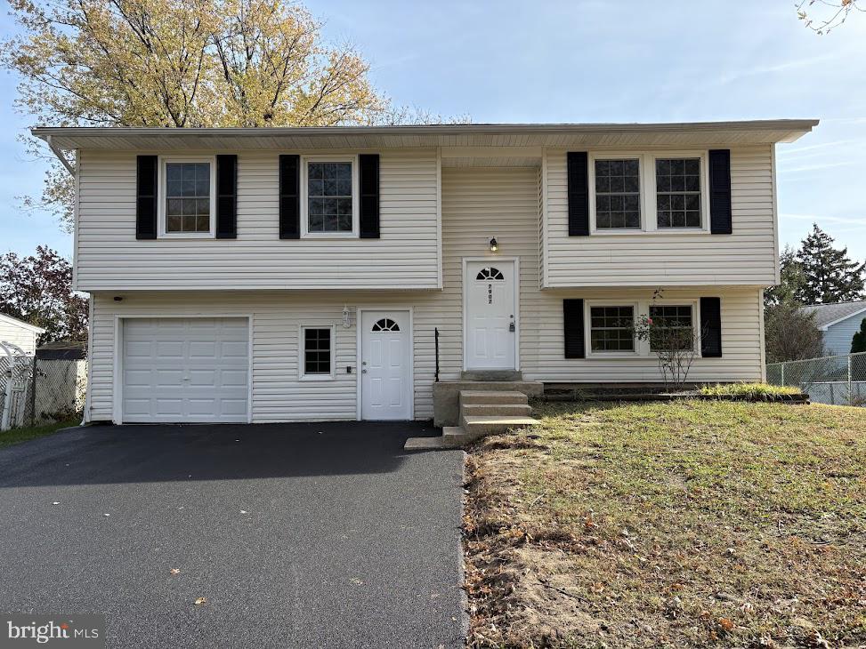 7907 Chalice Road Severn, MD 21144 - Photo 34 of 34 a front view of a house with a yard