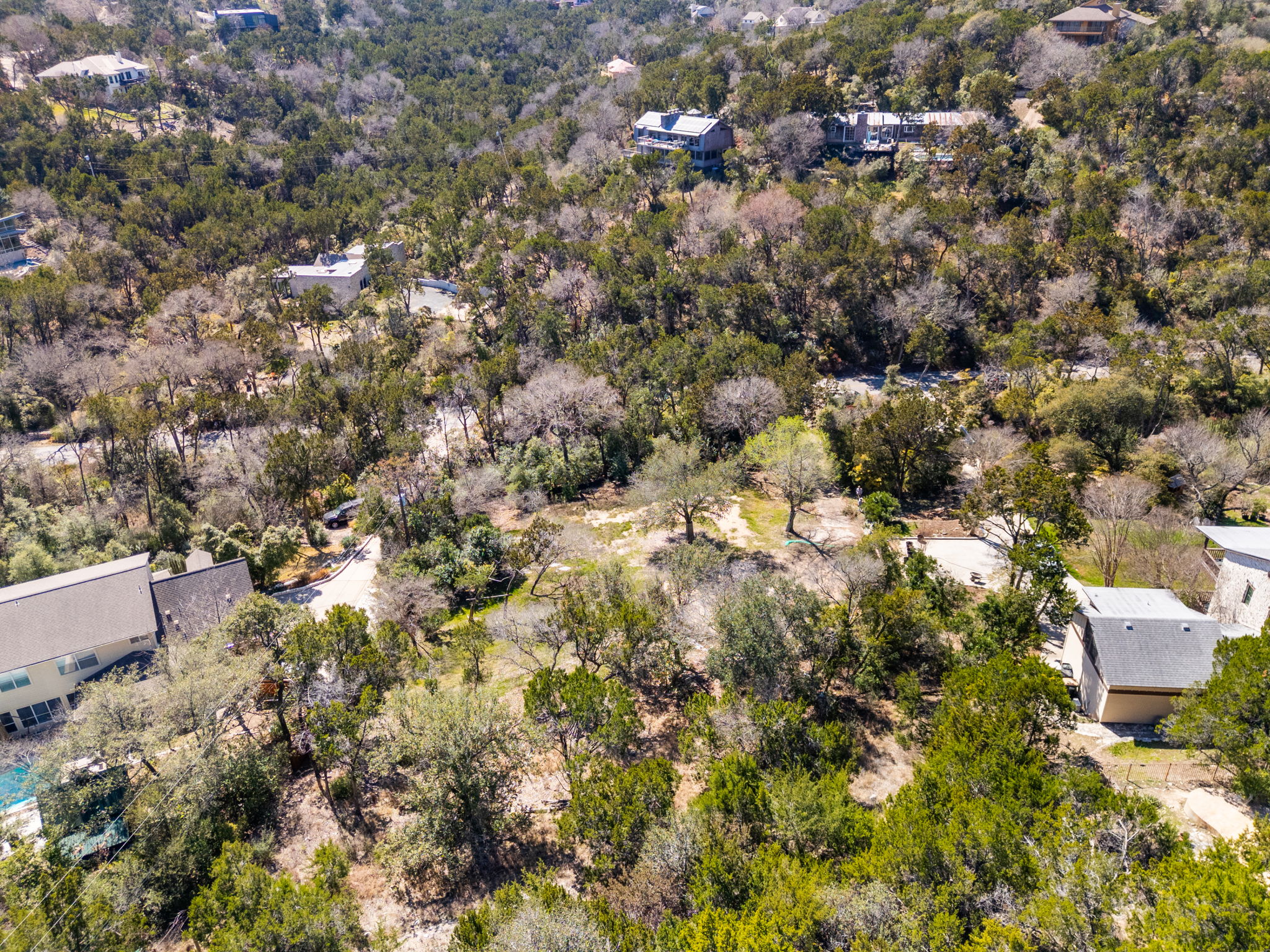 902 Yaupon Valley Road West Lake Hills, TX 78746 - Photo 22 of 25 an aerial view of residential house with parking and yard
