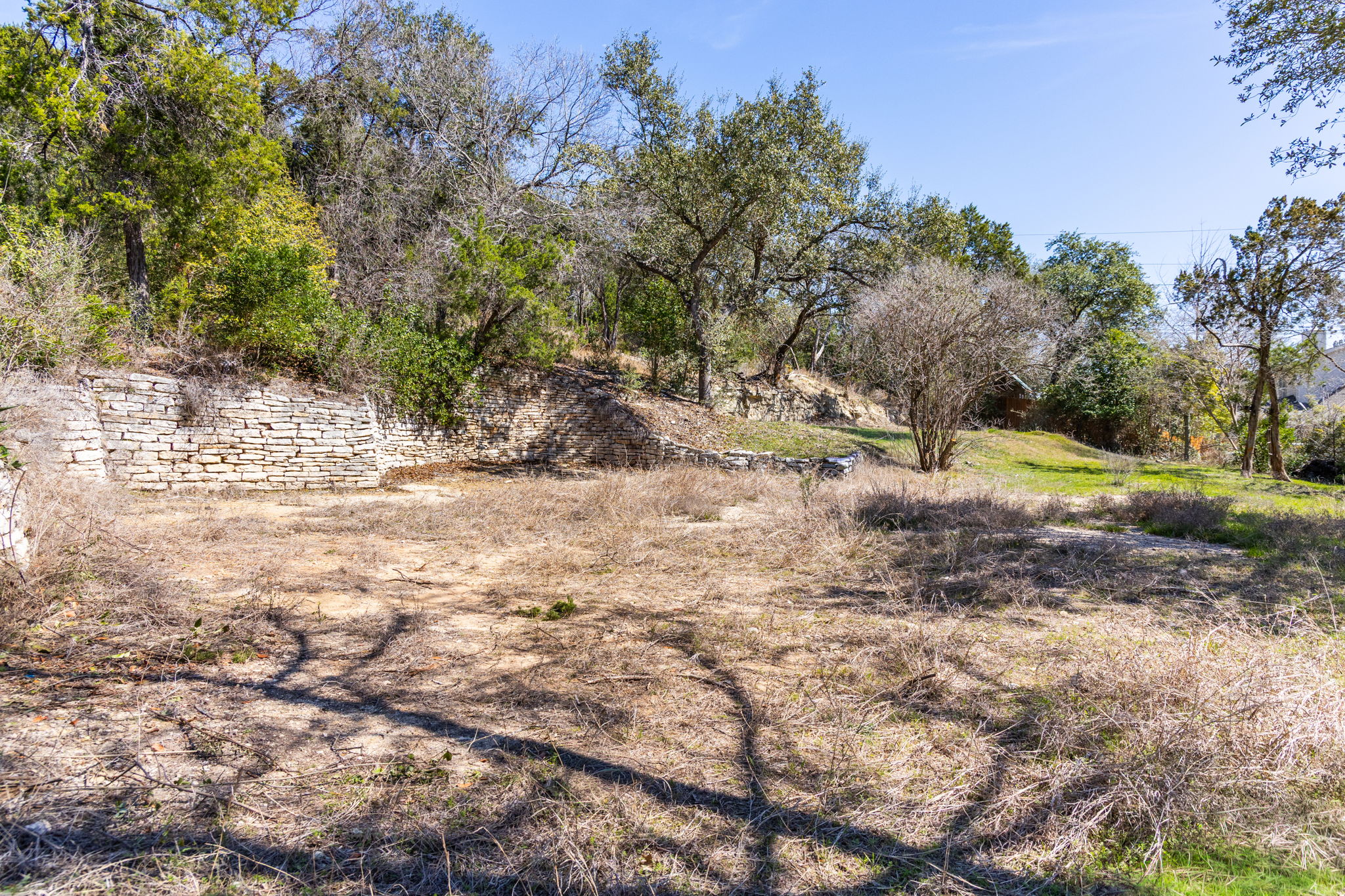 902 Yaupon Valley Road West Lake Hills, TX 78746 - Photo 3 of 25 a view of dirt yard with a tree