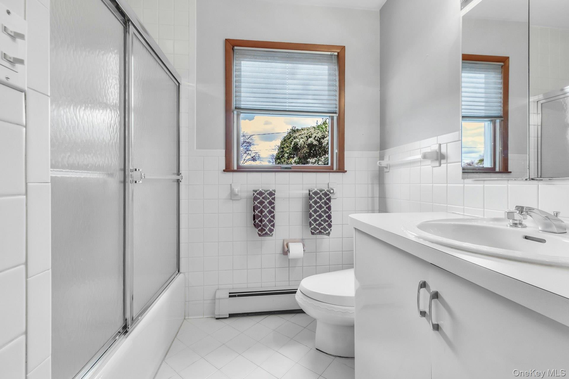8 Adelphi Street Islip, NY 11751 - Photo 21 of 38 1st Level Hallway Bath.