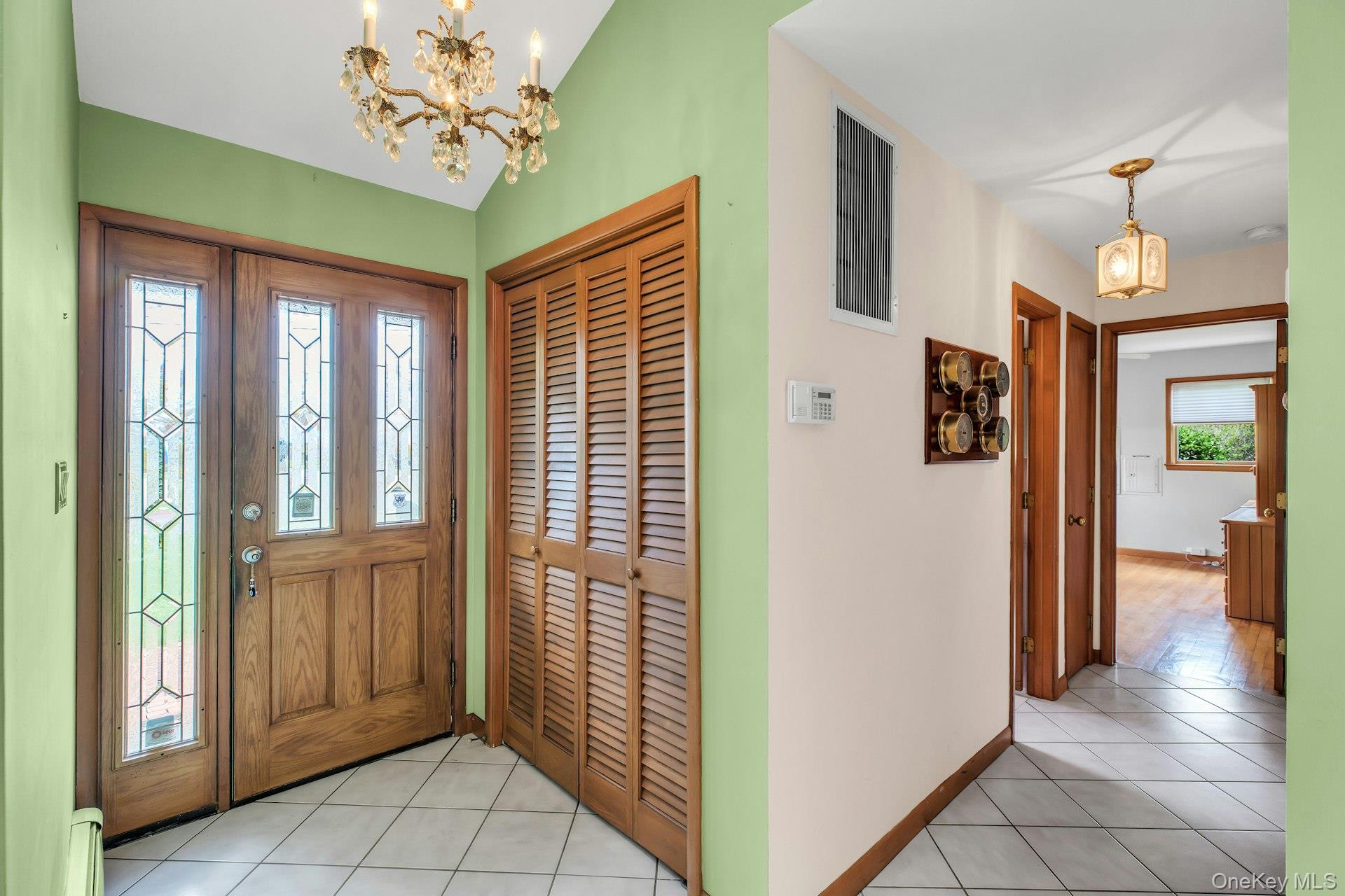 8 Adelphi Street Islip, NY 11751 - Photo 3 of 38 Generously Sized Entrance Foyer Separates Living Space From 1st Level Sleeping Quarters.
