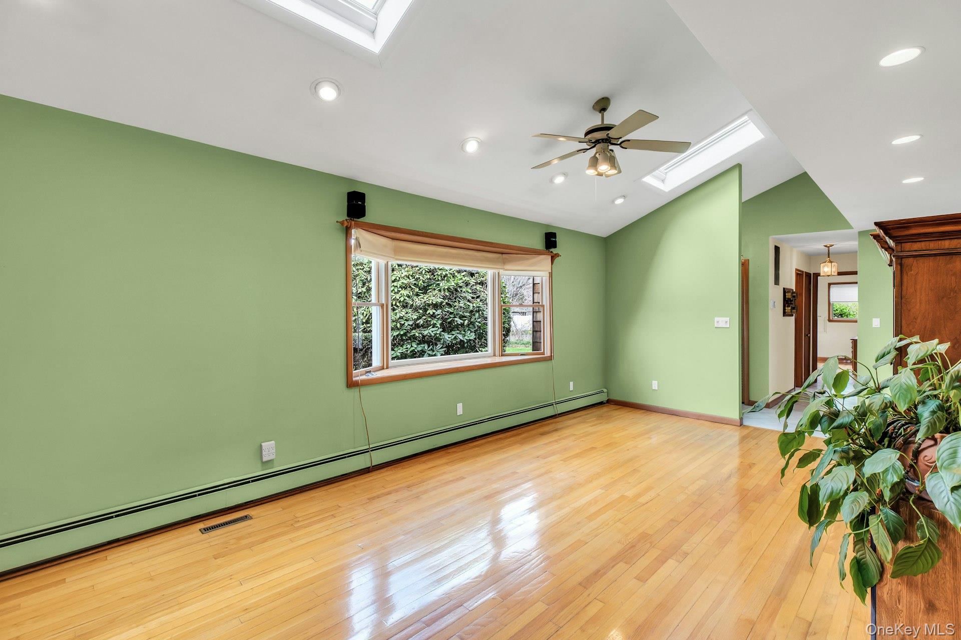 8 Adelphi Street Islip, NY 11751 - Photo 5 of 38 Living Room Alternate View Picturing Entrance to Foyer.