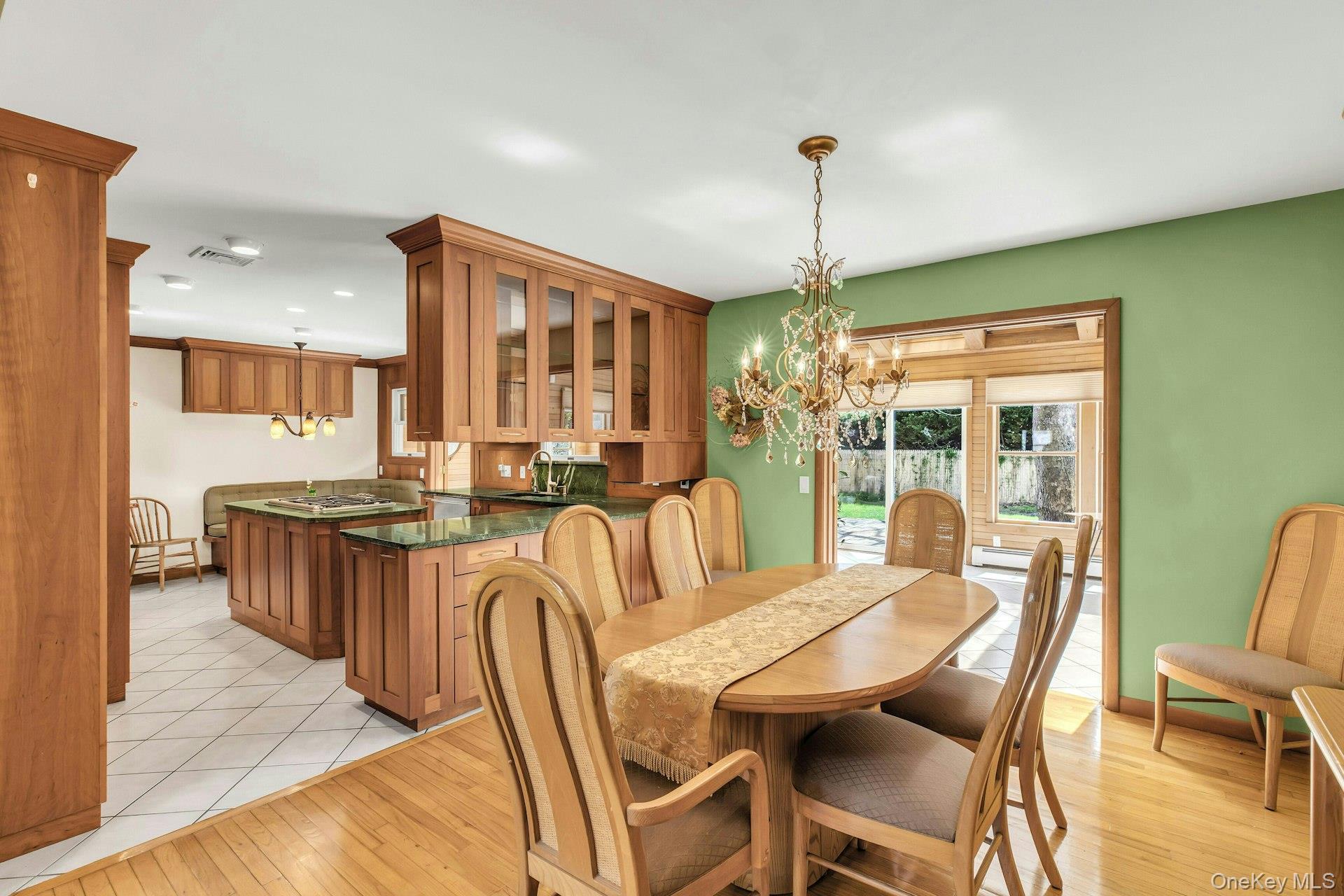 8 Adelphi Street Islip, NY 11751 - Photo 7 of 38 Dining Room Open to Chef's Kitchen and Sun Room Through Glass French Doors.