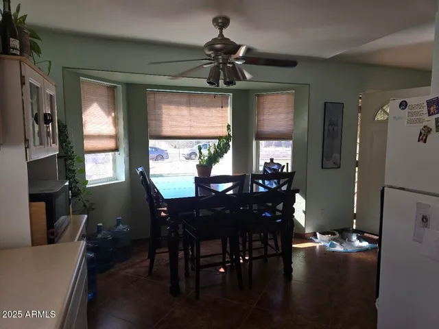 a dining room with furniture window wooden floor