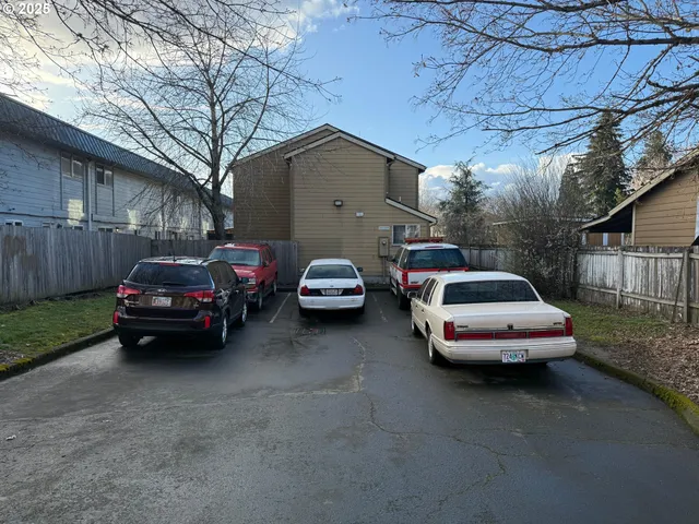 a car parked in front of a house