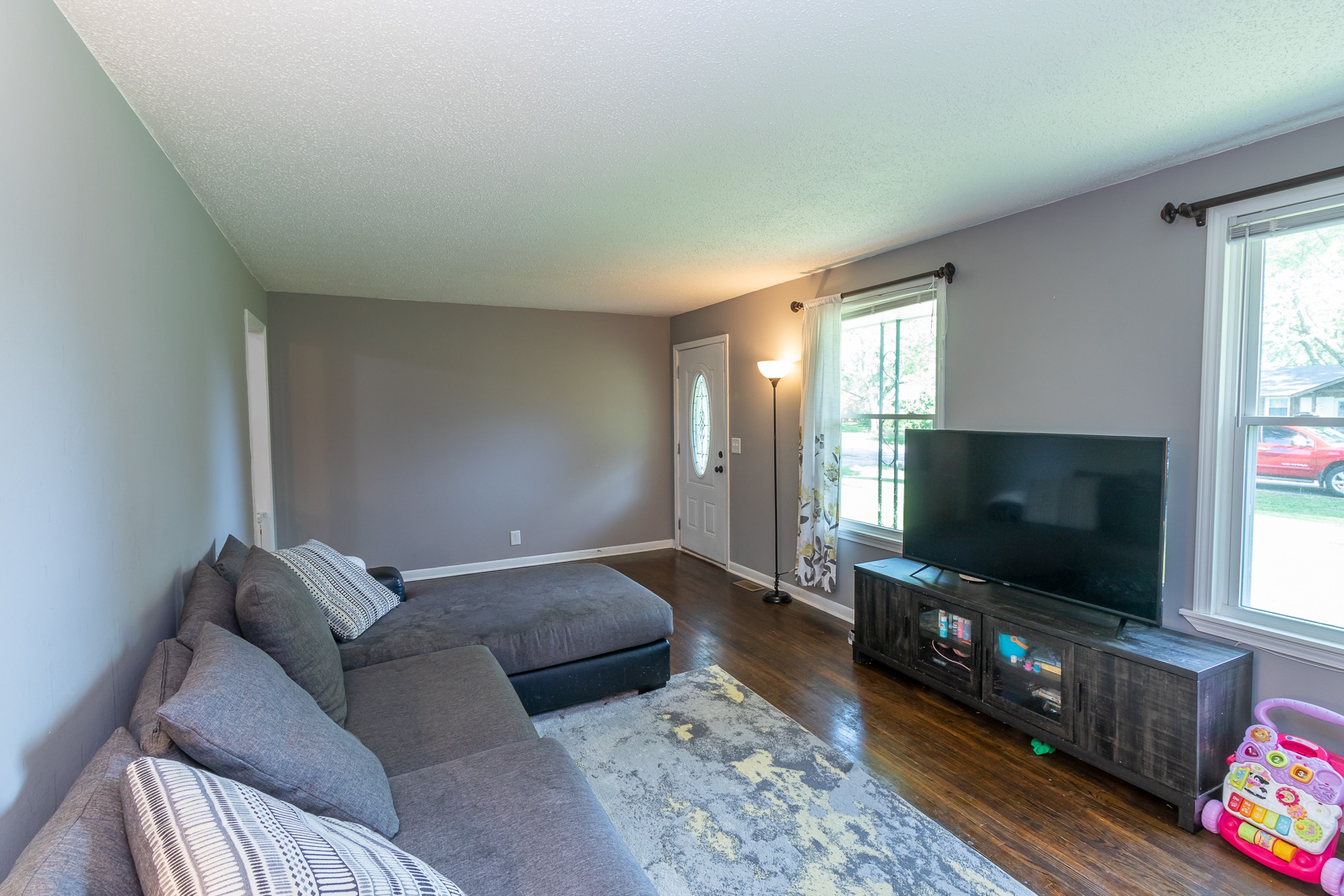 309 Notgrass Road Clarksville, TN 37042 - Photo 3 of 12 a living room with furniture and a flat screen tv