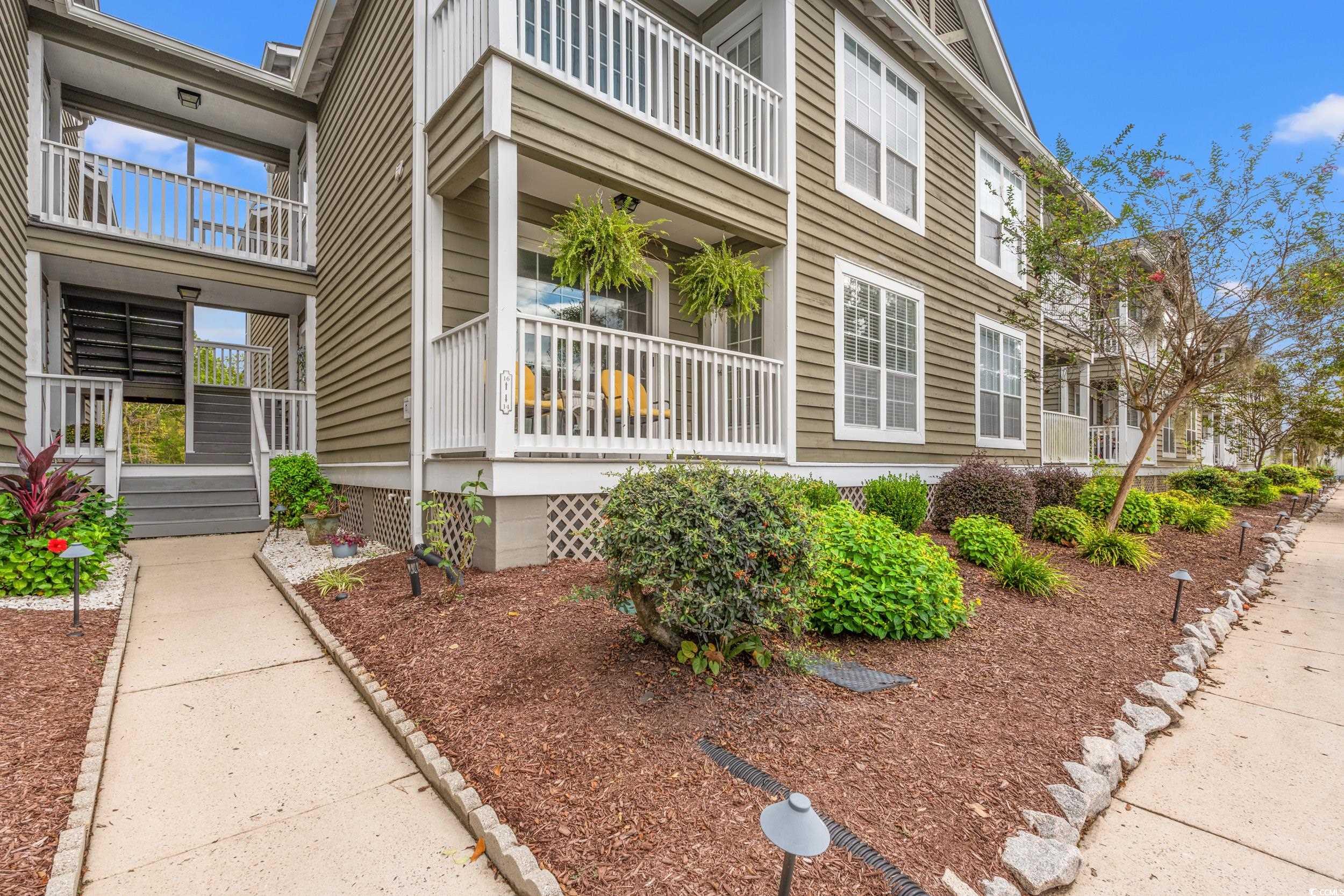14 Laurel Street, Unit 14 Conway, SC 29526 - Photo 37 of 40 View of property exterior featuring a balcony