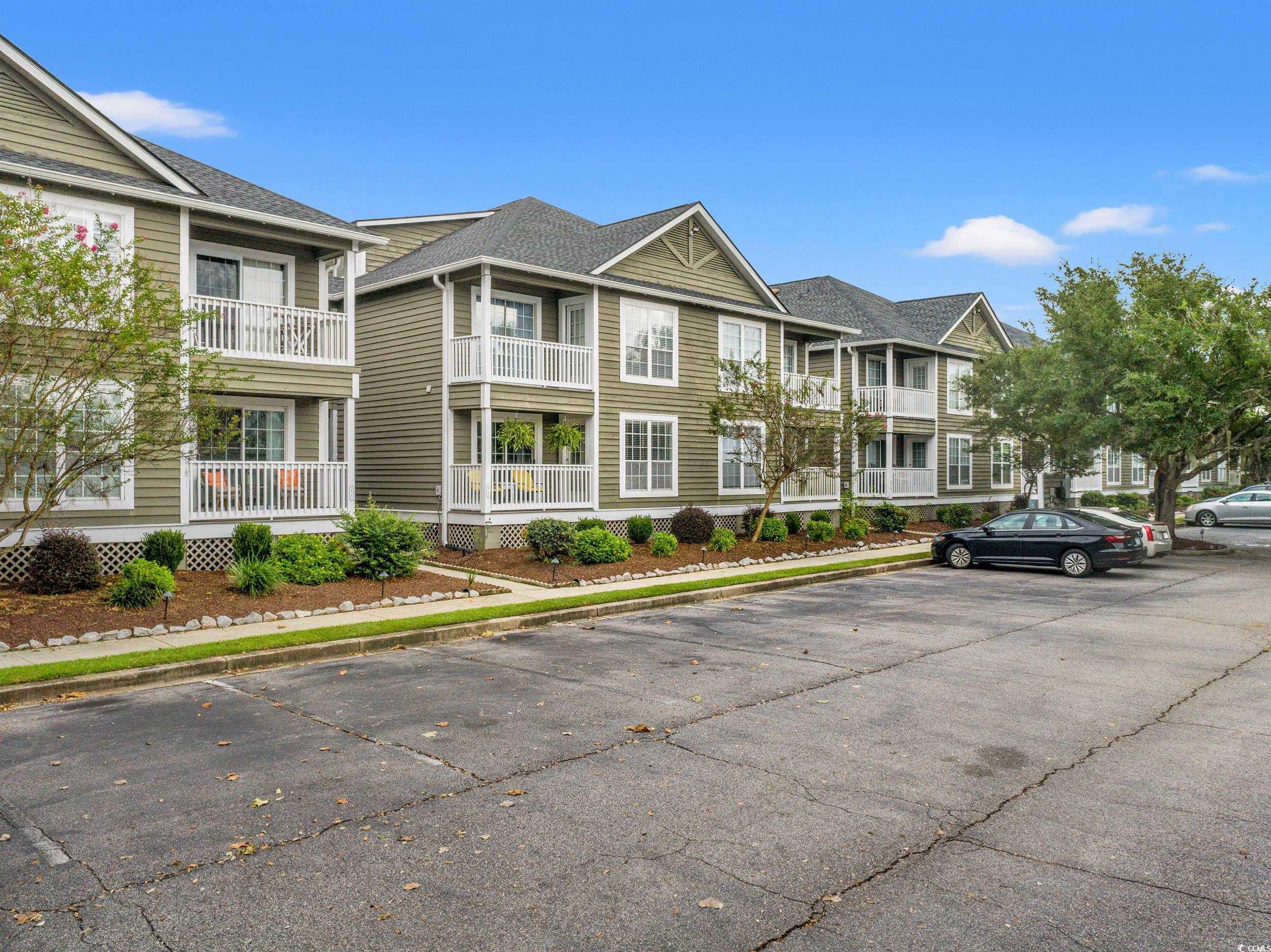 14 Laurel Street, Unit 14 Conway, SC 29526 - Photo 38 of 40 View of building exterior featuring uncovered parking