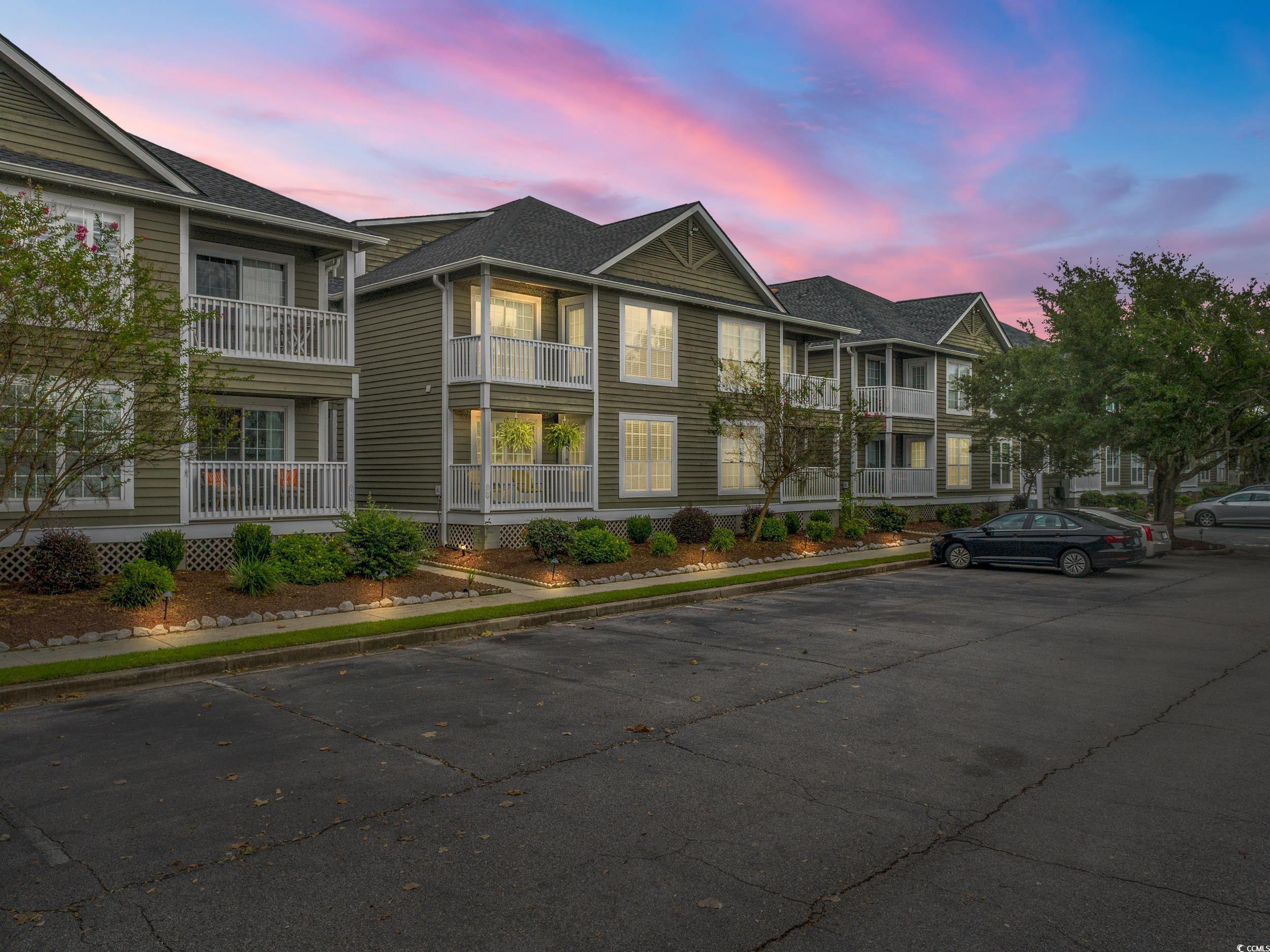 14 Laurel Street, Unit 14 Conway, SC 29526 - Photo 39 of 40 Property at dusk with uncovered parking