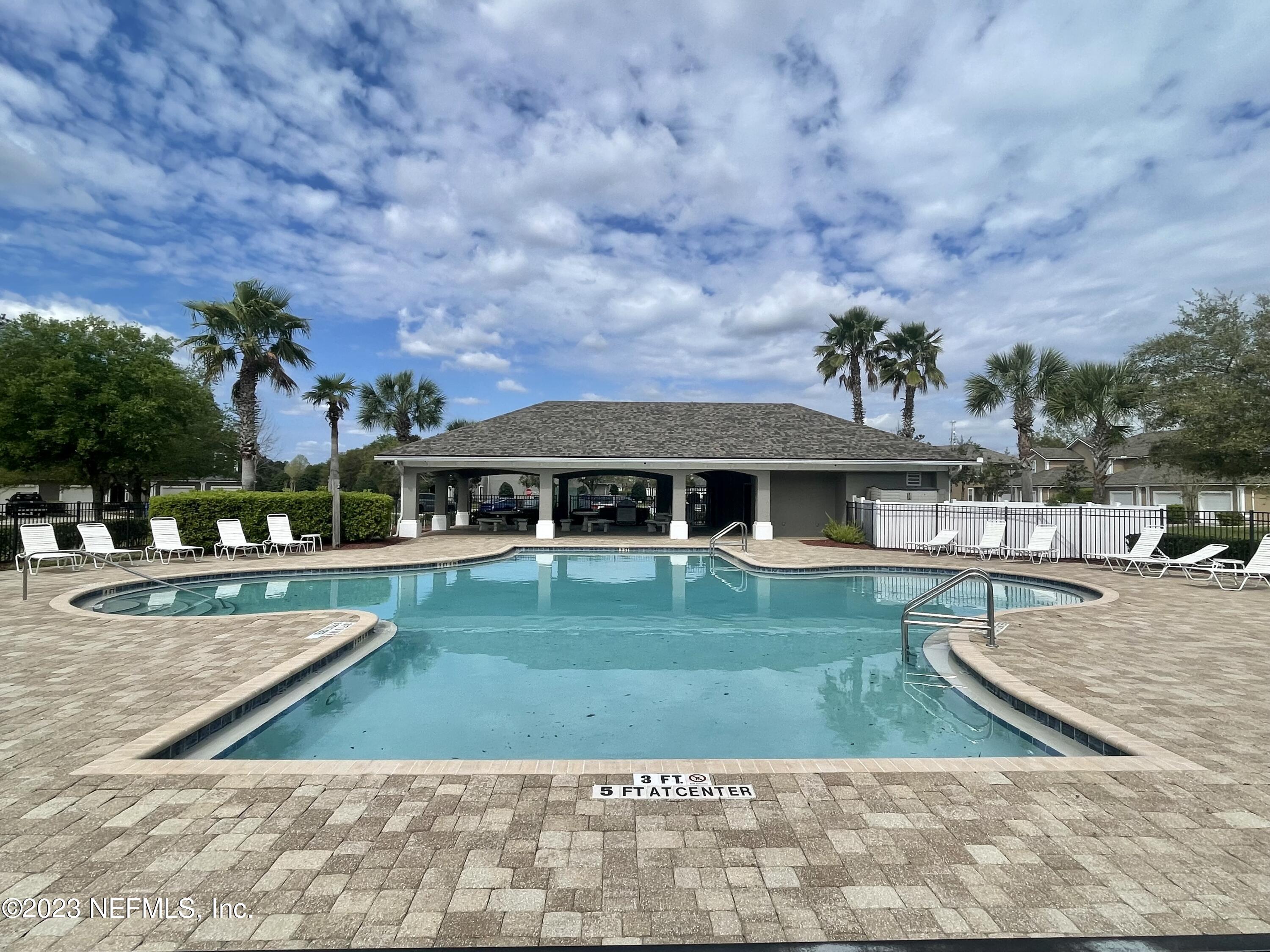 938 Scrub Jay Drive St. Augustine, FL 32092 - Photo 13 of 13 swimming pool view with seating space