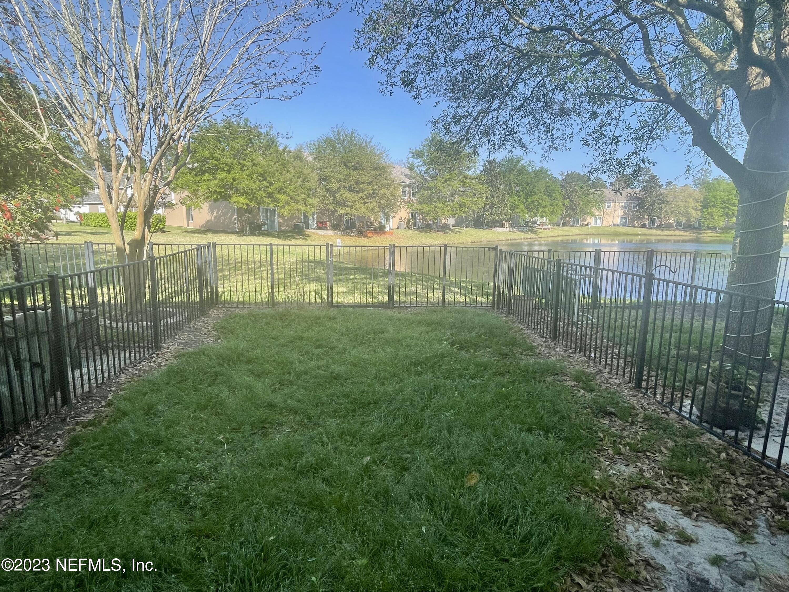 938 Scrub Jay Drive St. Augustine, FL 32092 - Photo 2 of 13 a view of a park with large trees