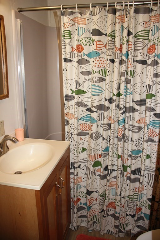3 York Road Colrain, MA 01340 - Photo 20 of 37 a bathroom with a granite countertop shower and a sink