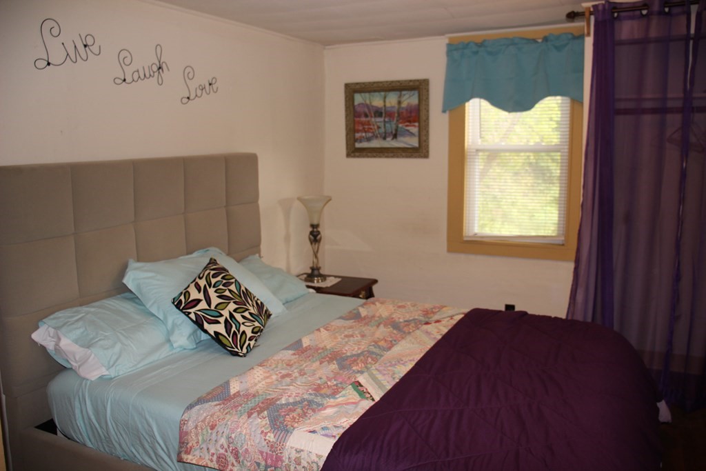 3 York Road Colrain, MA 01340 - Photo 21 of 37 a bedroom with a bed and a window