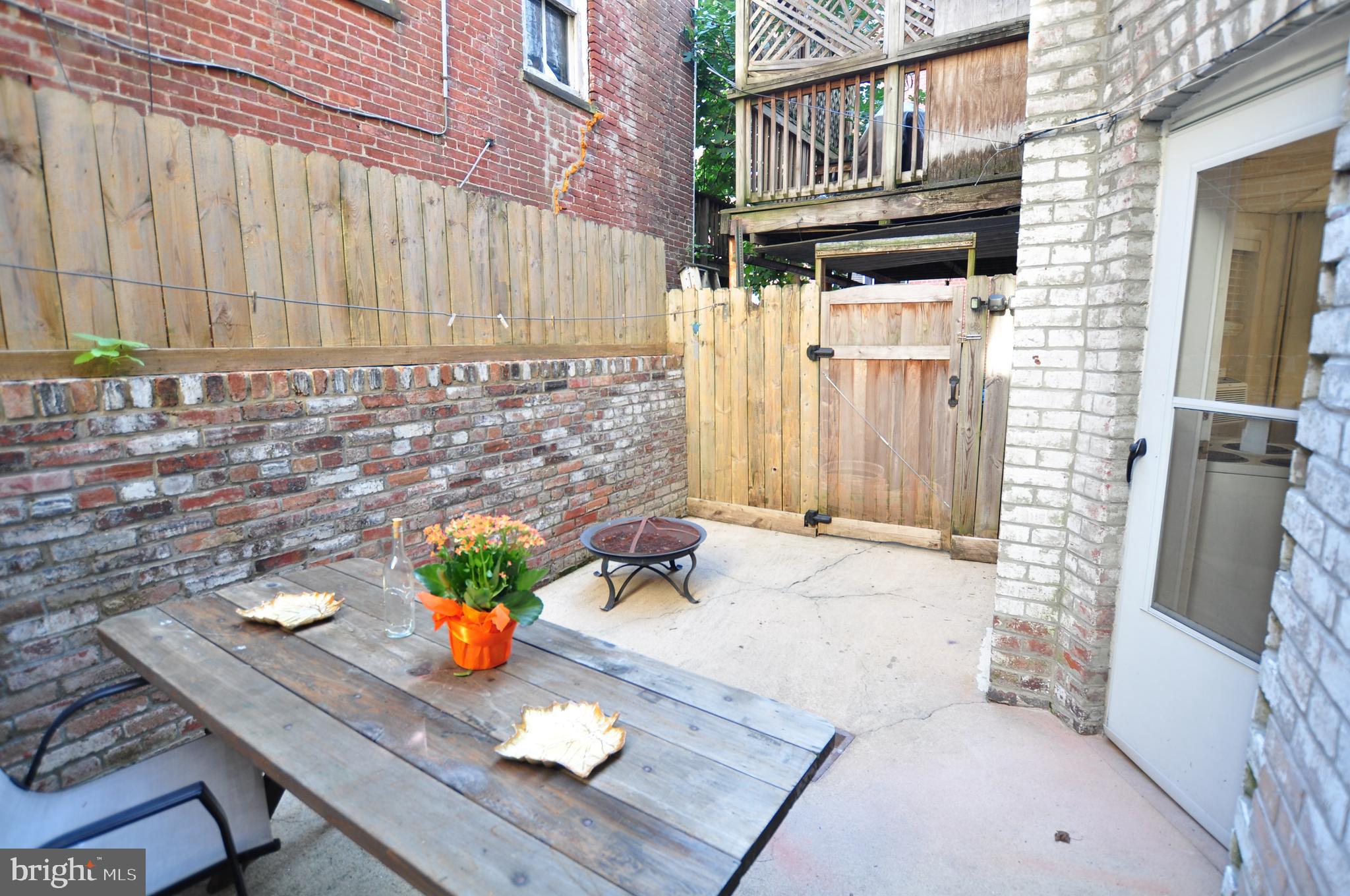 1904 Calvert Street Northwest Washington, DC 20009 - Photo 13 of 13 a bath room with a sink