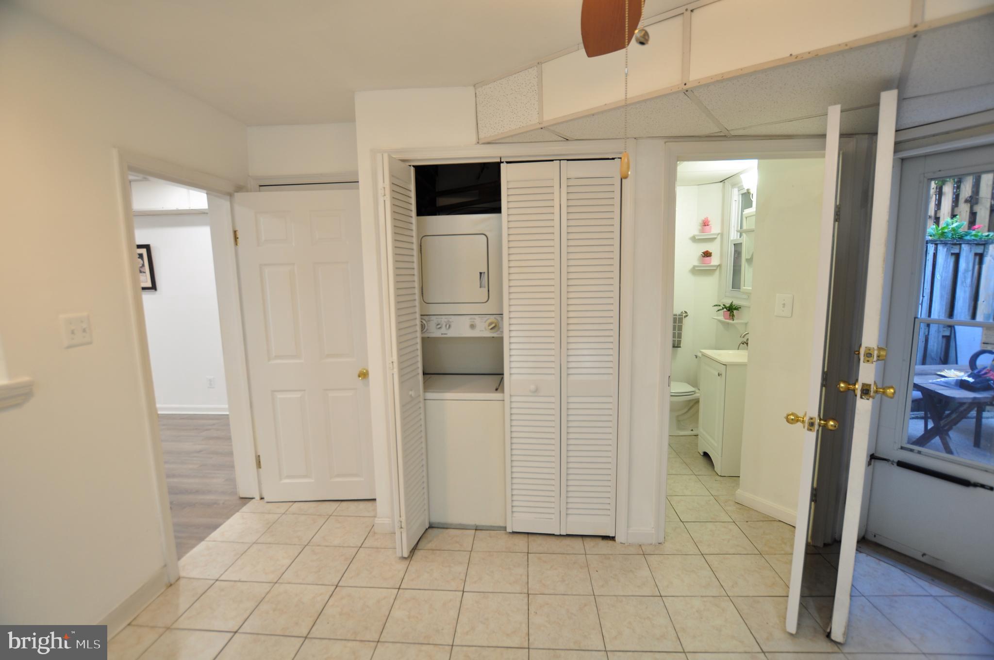 1904 Calvert Street Northwest Washington, DC 20009 - Photo 9 of 13 a view of a livingroom with wooden floor