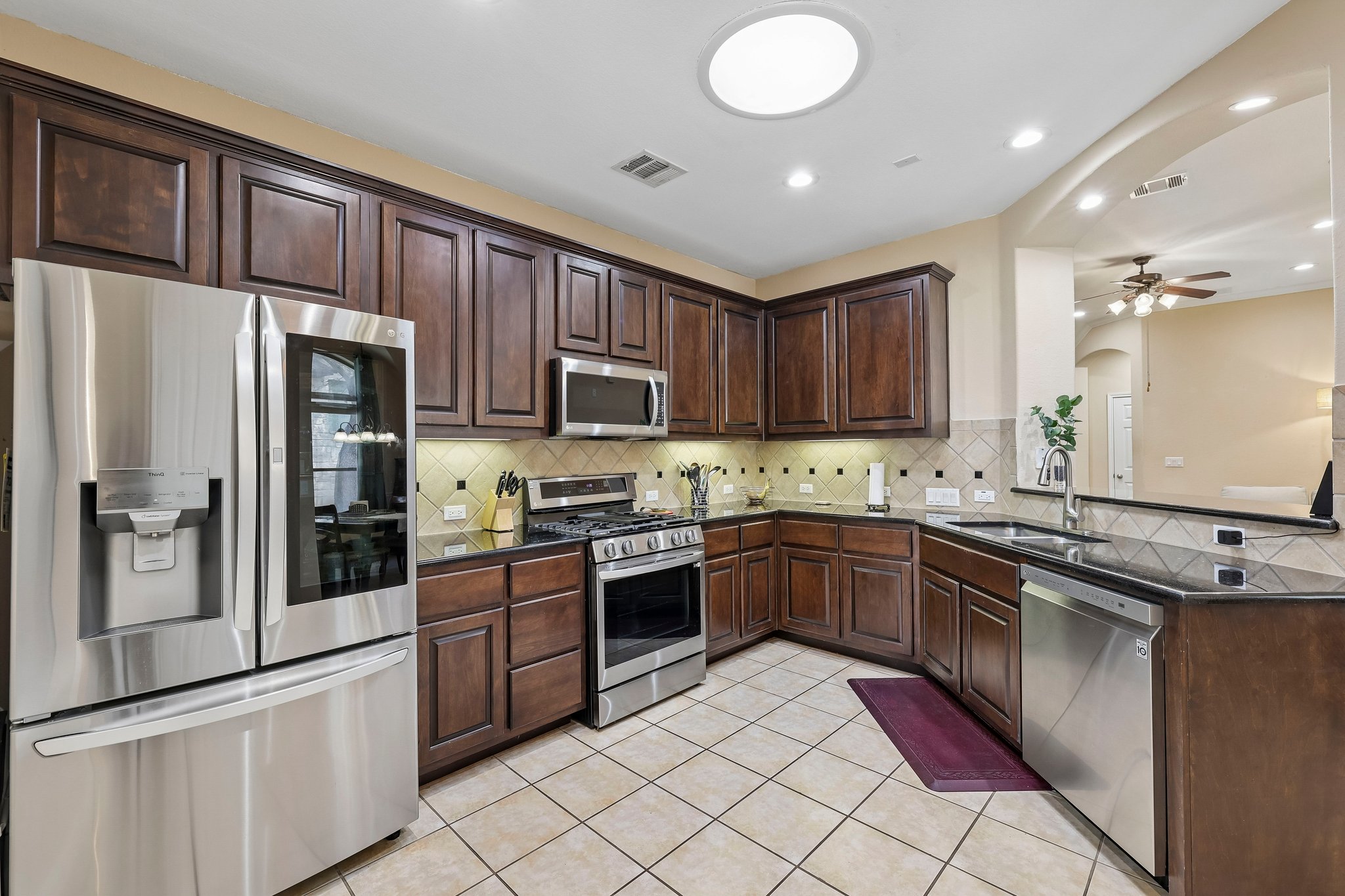 14100 Avery Ranch Boulevard, Unit 1001 Austin, TX 78717 - Photo 3 of 35 Tons of Cabinets and Open to Dining/Living