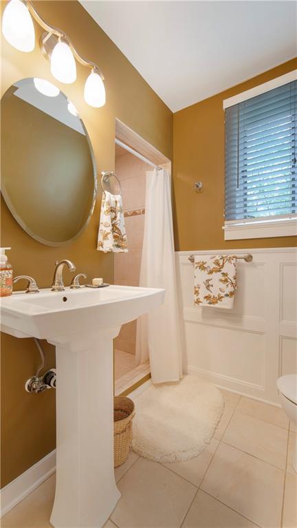 2034 Mohawk Road Pittsburgh, PA 15241 - Photo 17 of 25 a bathroom with a sink mirror vanity and toilet