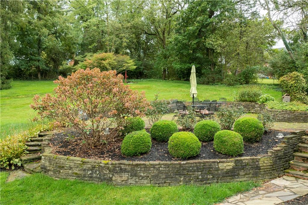 2034 Mohawk Road Pittsburgh, PA 15241 - Photo 22 of 25 a backyard of a house with lots of green space