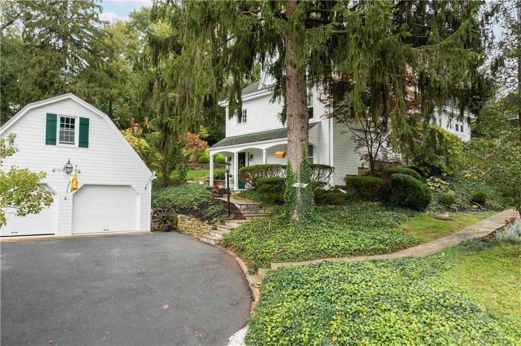 2034 Mohawk Road Pittsburgh, PA 15241 - Photo 23 of 25 a house with trees in the background