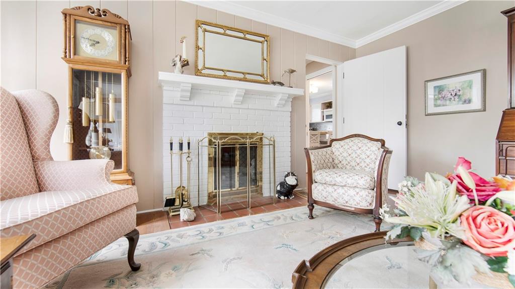 2034 Mohawk Road Pittsburgh, PA 15241 - Photo 4 of 25 a living room with furniture and a fireplace