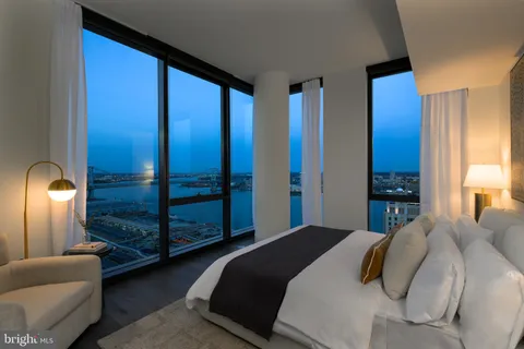 a bedroom with a bed and with walk in closet