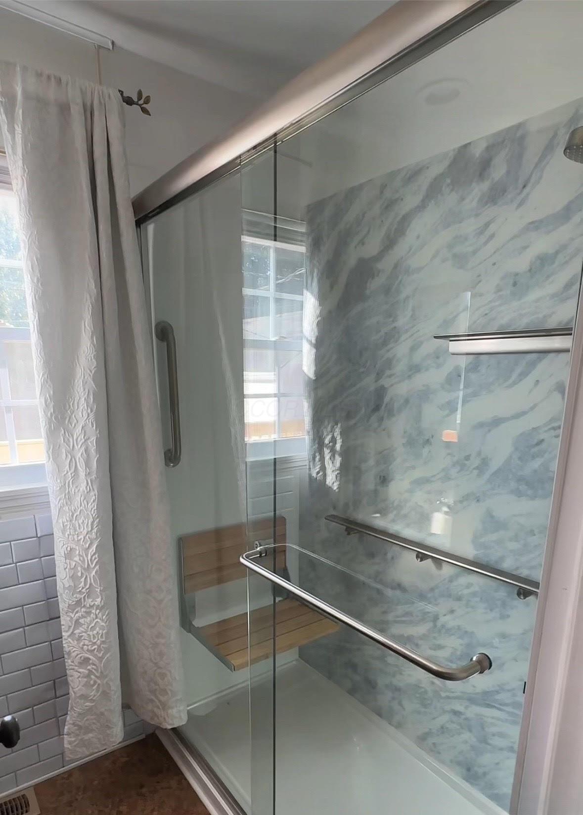 587 Richards Road Columbus, OH 43214 - Photo 7 of 16 Full bathroom with shower and natural light