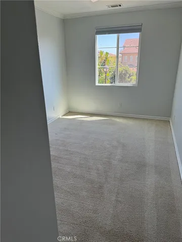 a view of an empty room and window