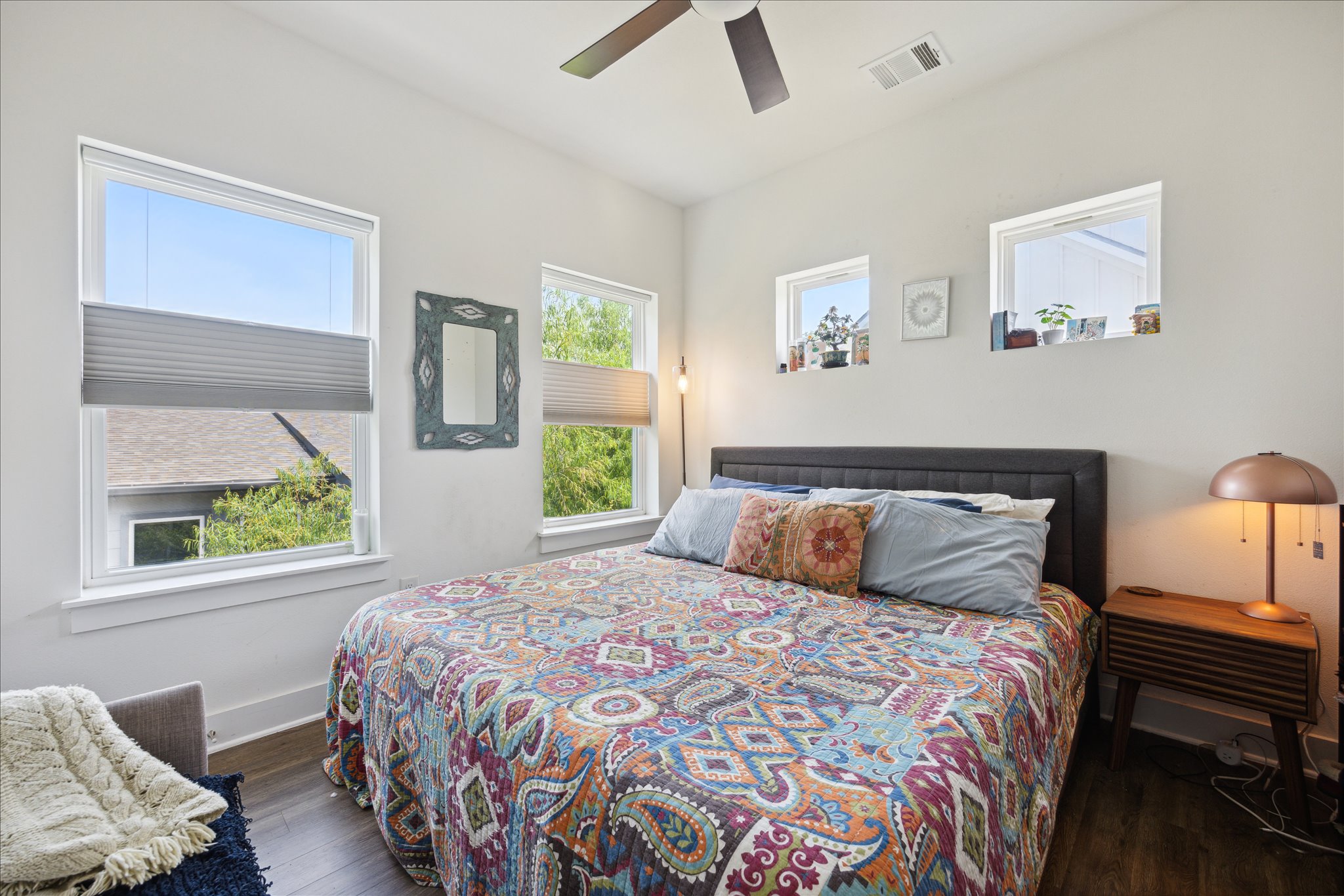 5006 Baker Street, Unit B Austin, TX 78721 - Photo 10 of 16 a bedroom with a bed and a window