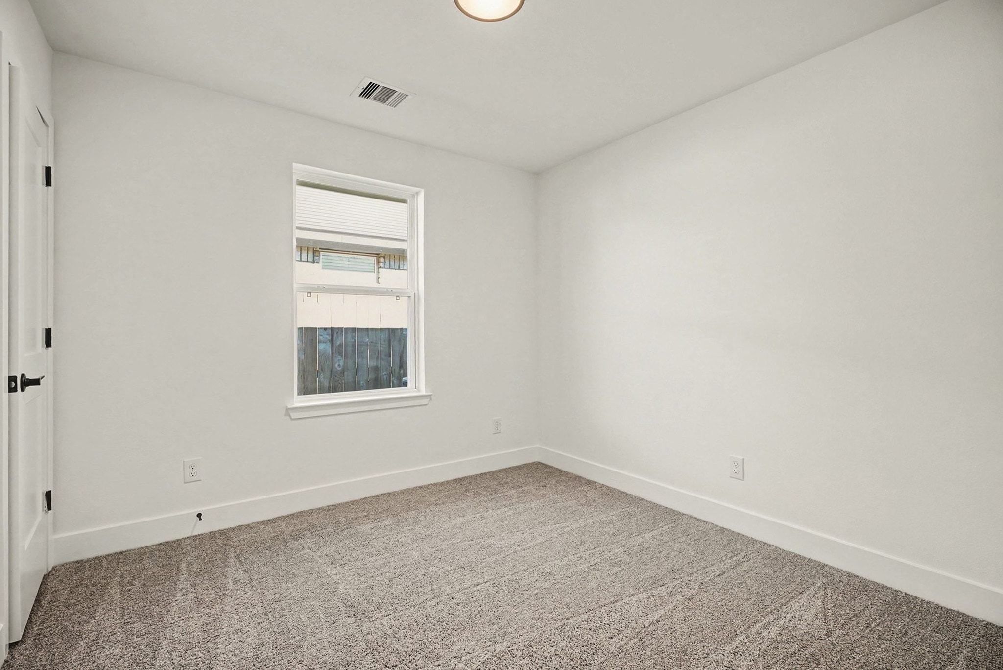 2 Keystone Court Angleton, TX 77515 - Photo 27 of 30 a room with a window and closet