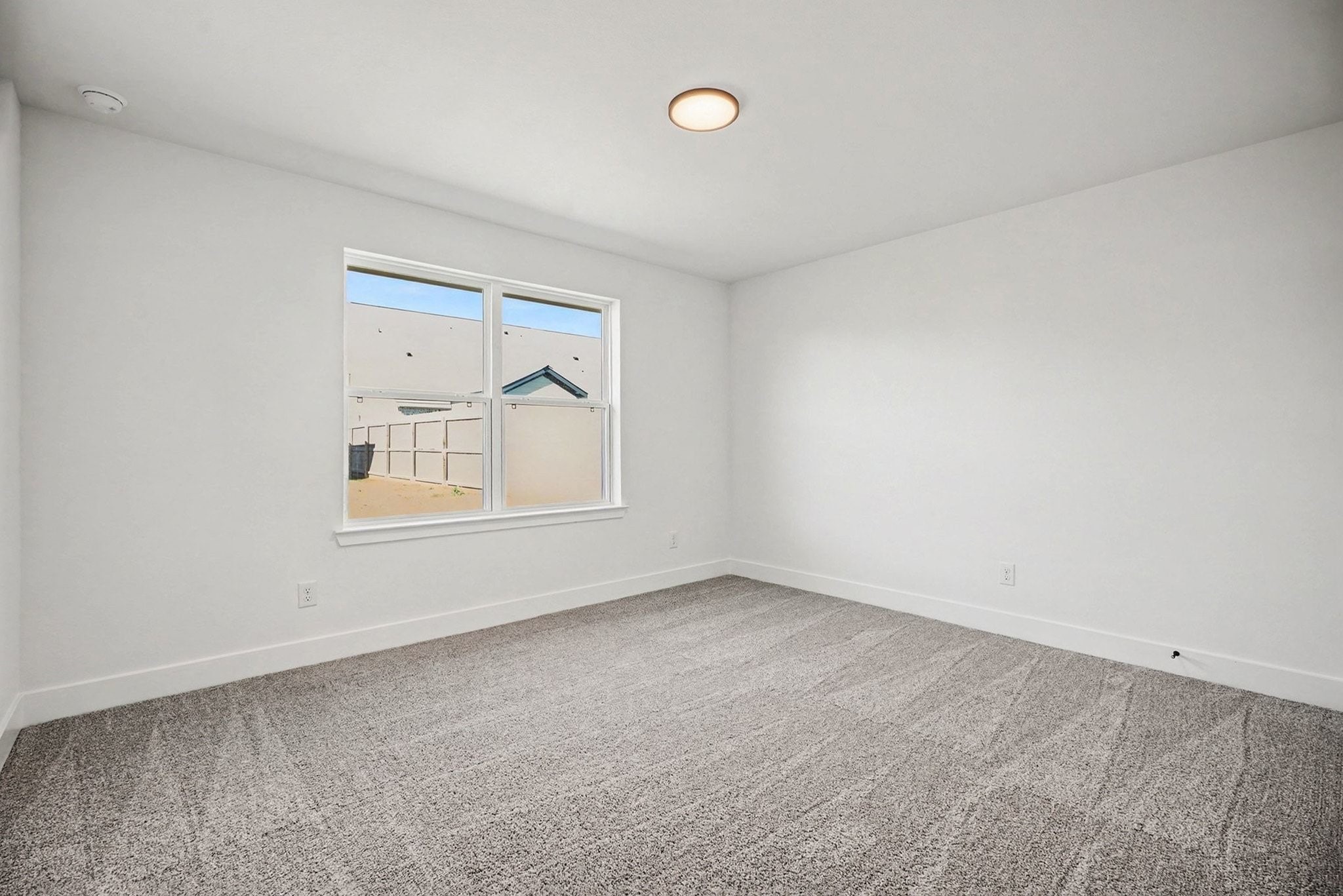 2 Keystone Court Angleton, TX 77515 - Photo 28 of 30 a view of an empty room with a window