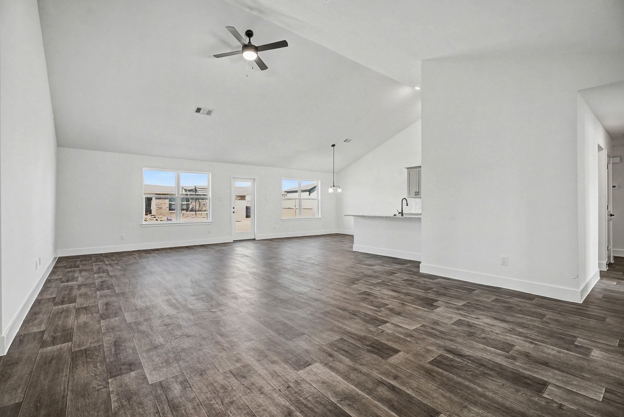 2 Keystone Court Angleton, TX 77515 - Photo 8 of 30 an empty room with windows