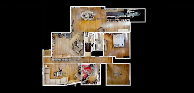 an aerial view of a house with a swimming pool and outdoor space