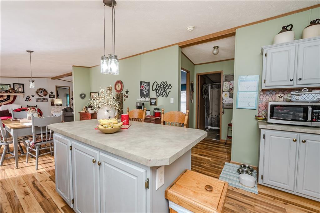 464 Rte 119 Highway North Indiana, PA 15701 - Photo 13 of 37 a open kitchen with stainless steel appliances granite countertop a stove and a refrigerator