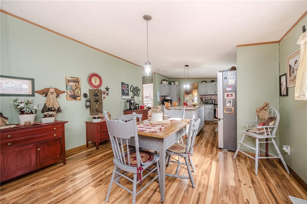 464 Rte 119 Highway North Indiana, PA 15701 - Photo 14 of 37 a view of a dining room with furniture and wooden floor