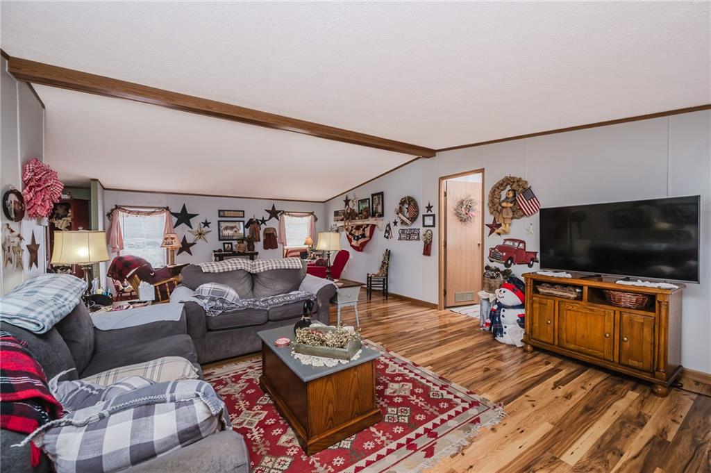 464 Rte 119 Highway North Indiana, PA 15701 - Photo 17 of 37 a living room with furniture and a flat screen tv