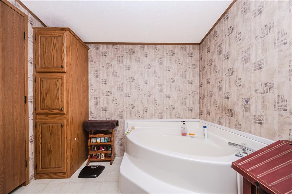 464 Rte 119 Highway North Indiana, PA 15701 - Photo 22 of 37 a bathroom with a bathtub and shower