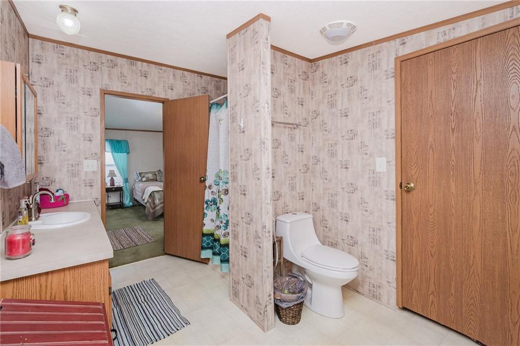 464 Rte 119 Highway North Indiana, PA 15701 - Photo 23 of 37 a living room with a couch and a curtain