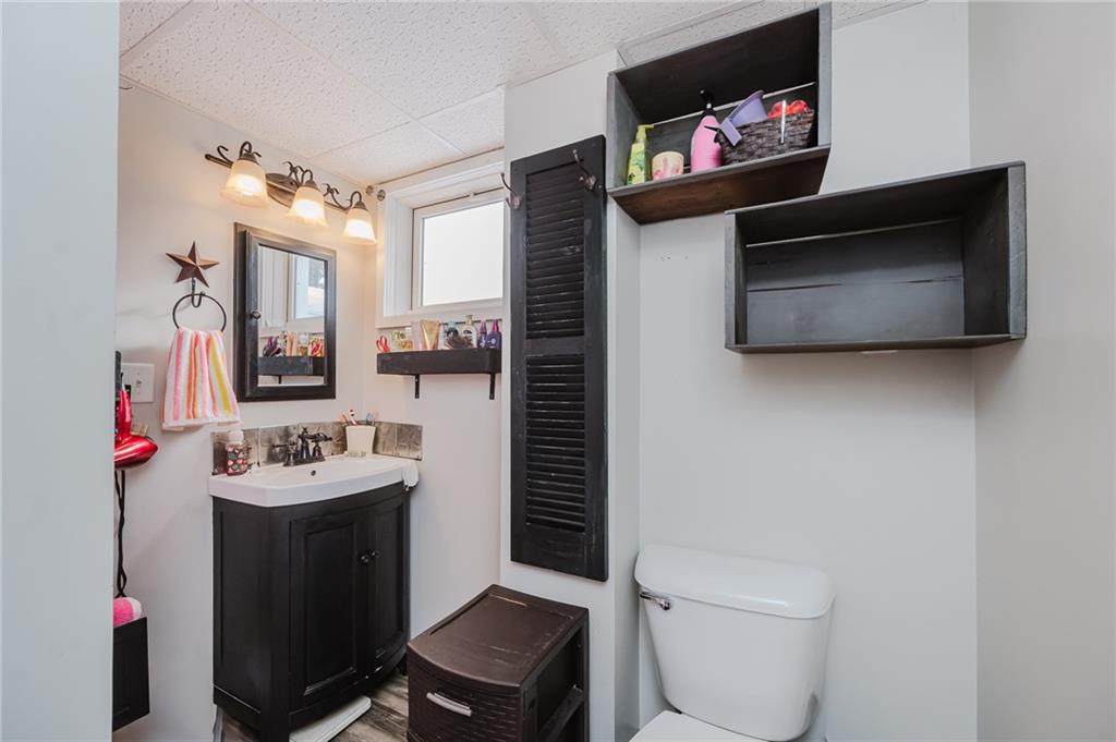 464 Rte 119 Highway North Indiana, PA 15701 - Photo 34 of 37 a bathroom with a sink toilet vanity and mirror