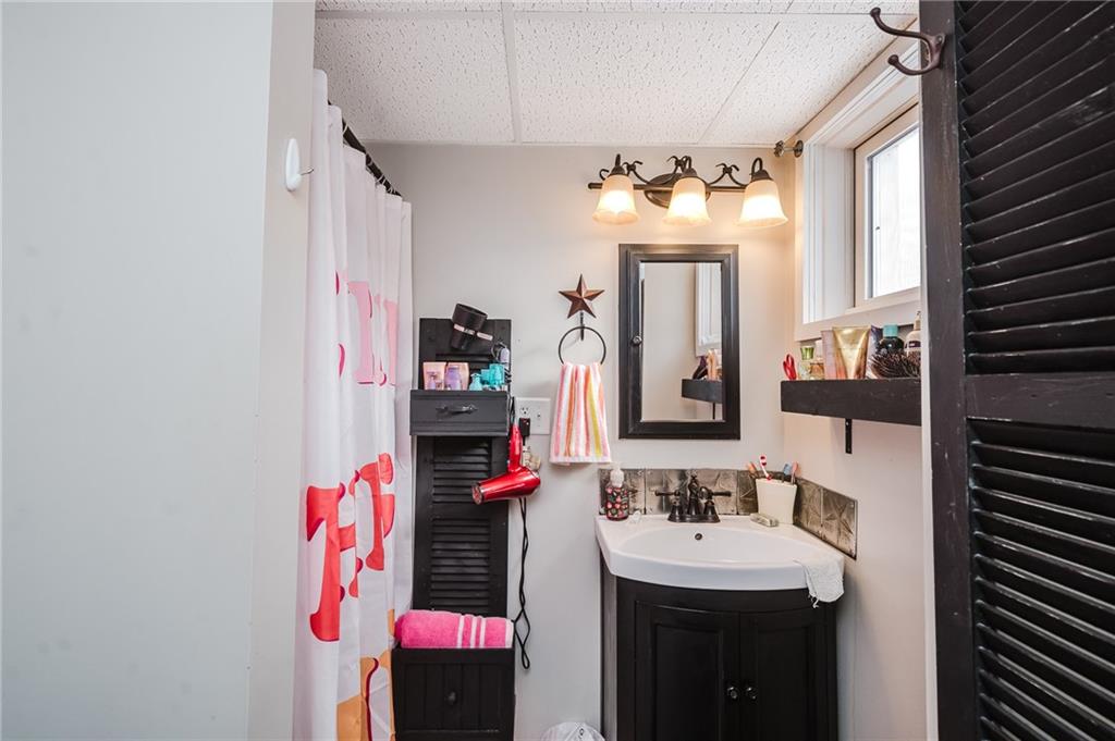 464 Rte 119 Highway North Indiana, PA 15701 - Photo 35 of 37 a bathroom with a sink vanity and a mirror