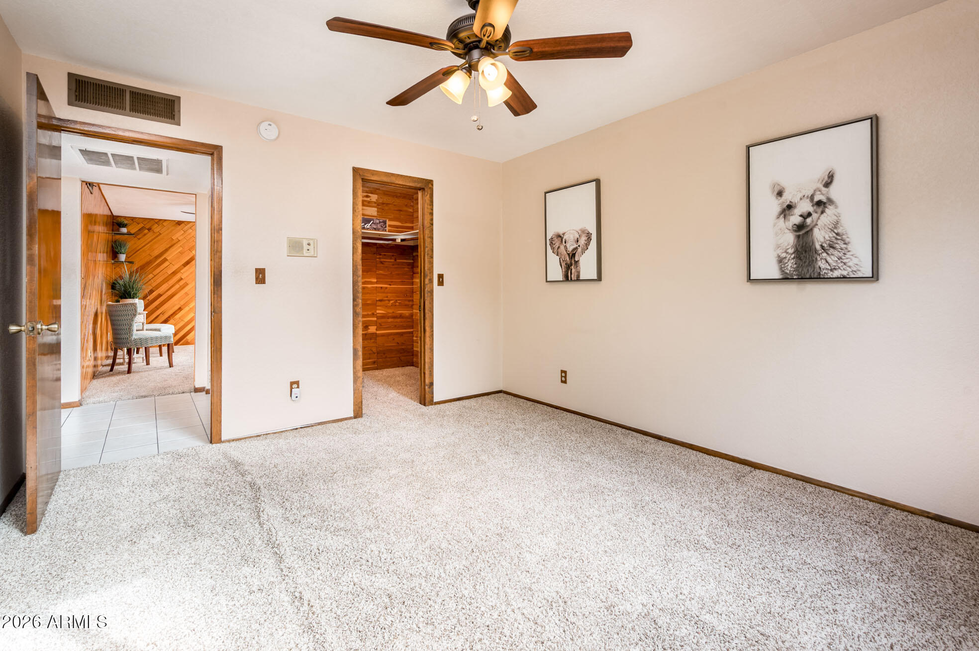 7027 West Wagoner Road Glendale, AZ 85308 - Photo 22 of 29 a view of a big room with closet and windows