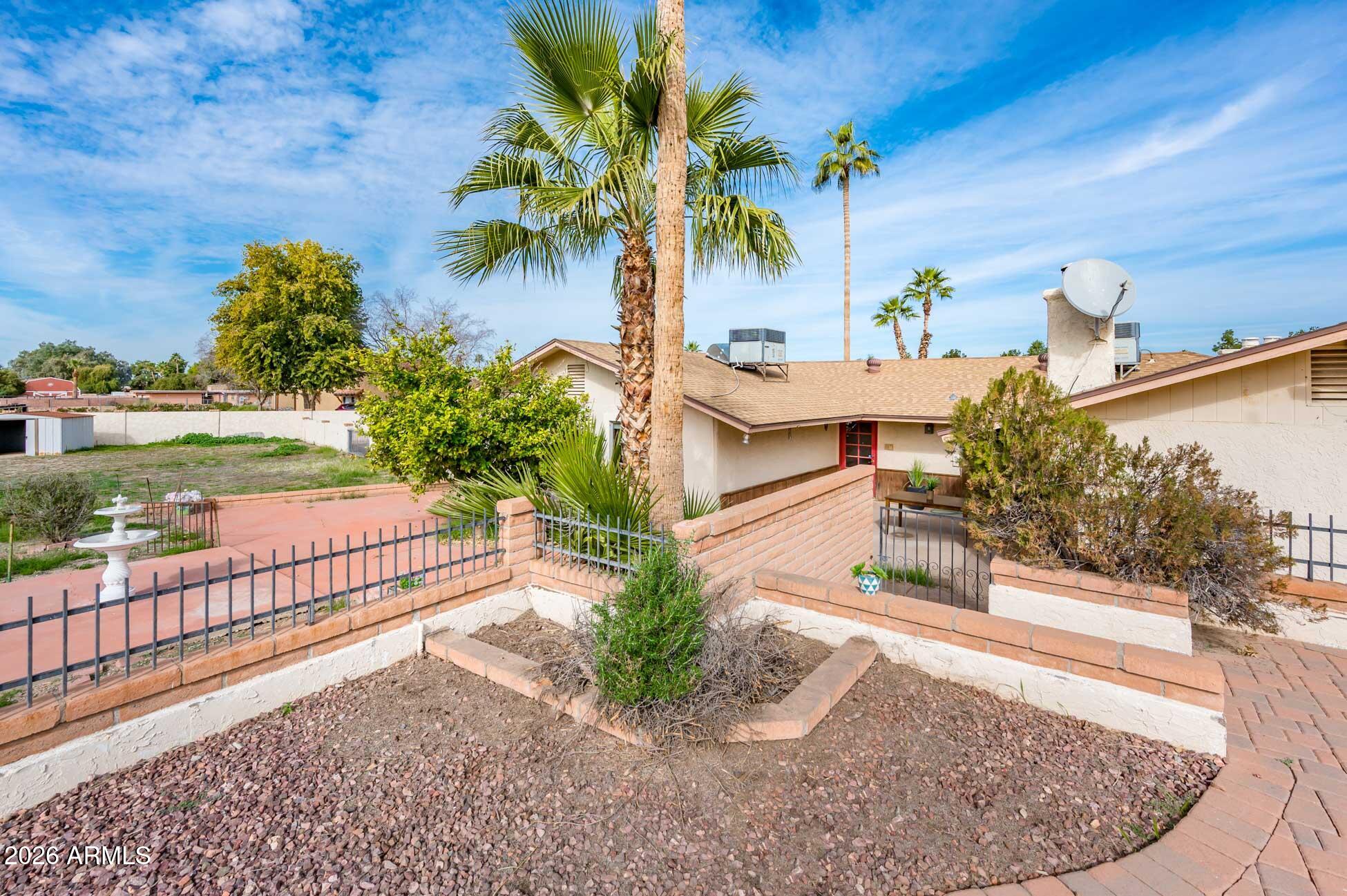 7027 West Wagoner Road Glendale, AZ 85308 - Photo 27 of 29 a view of a backyard