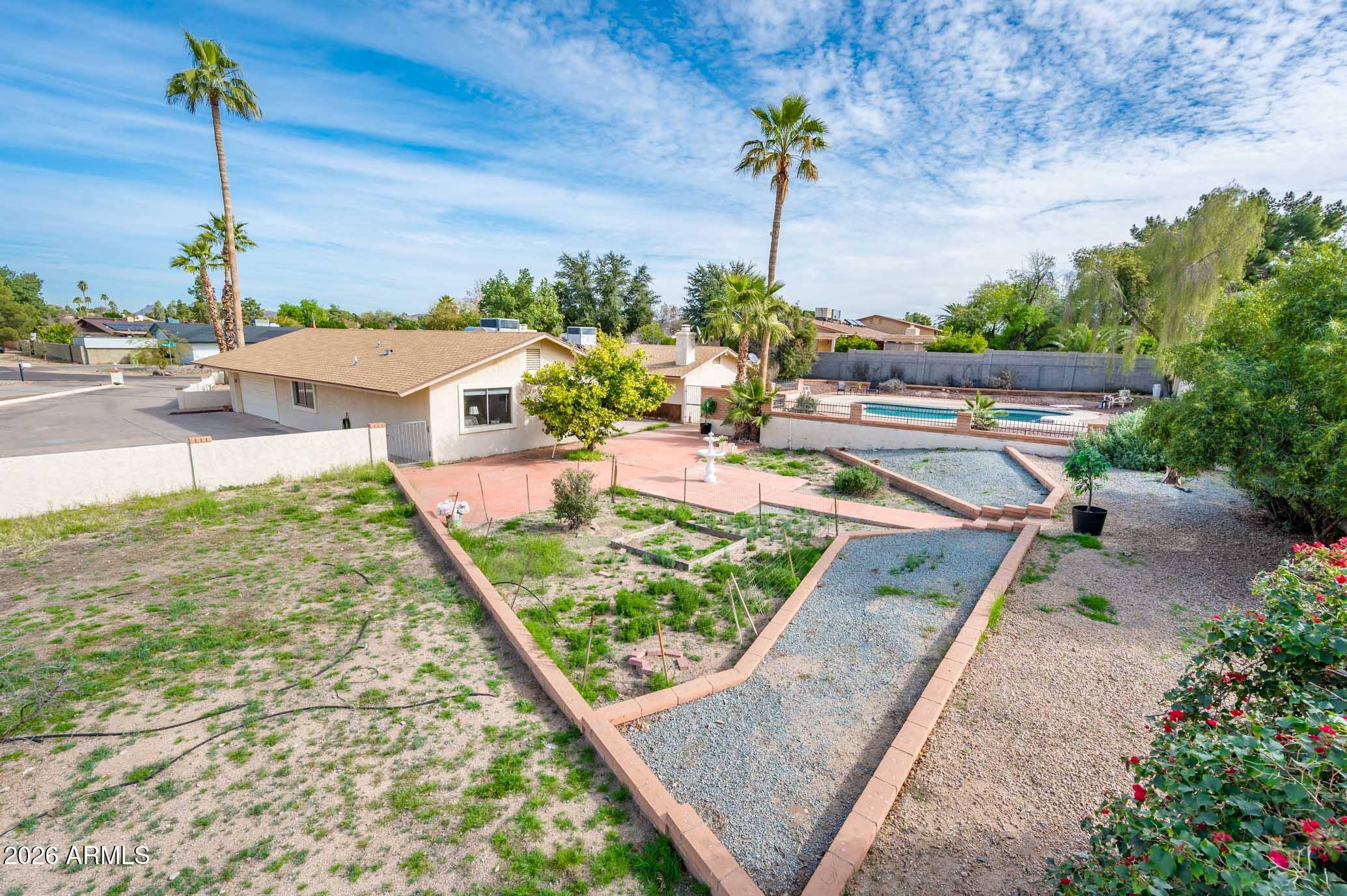 7027 West Wagoner Road Glendale, AZ 85308 - Photo 29 of 29 a view of a backyard with plants