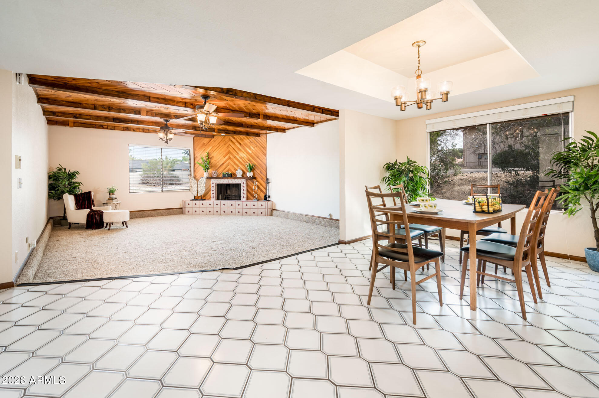 7027 West Wagoner Road Glendale, AZ 85308 - Photo 7 of 29 a view of a dining room with furniture and chandelier