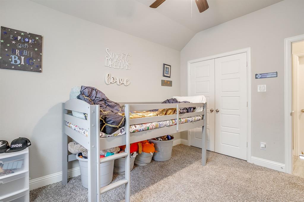 940 Sam Street Springtown, TX 76082 - Photo 32 of 39 a room with storage and utility