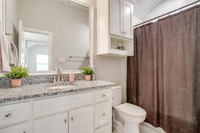a living room with furniture and window