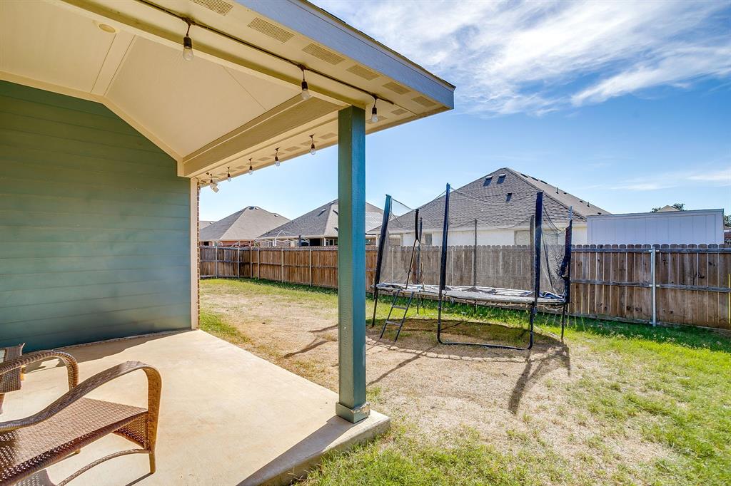 940 Sam Street Springtown, TX 76082 - Photo 36 of 39 a house view with a backyard space