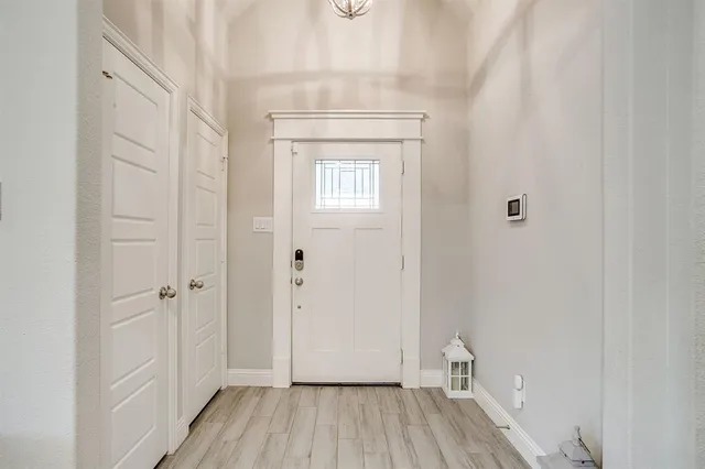 a view of kitchen with furniture and wooden floor