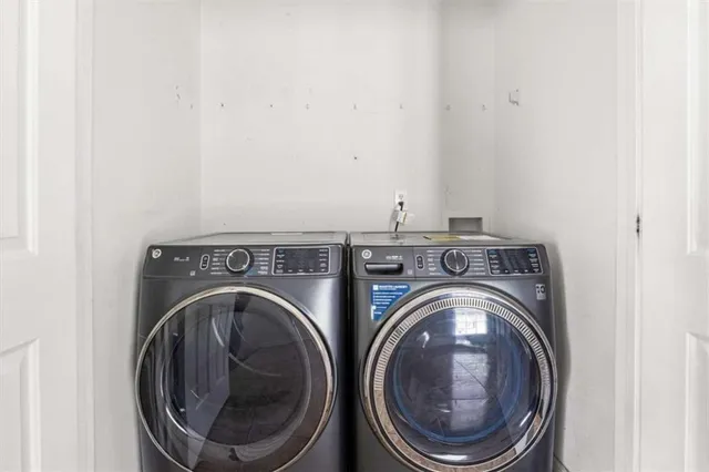 a view of washer and dryer in a utility room