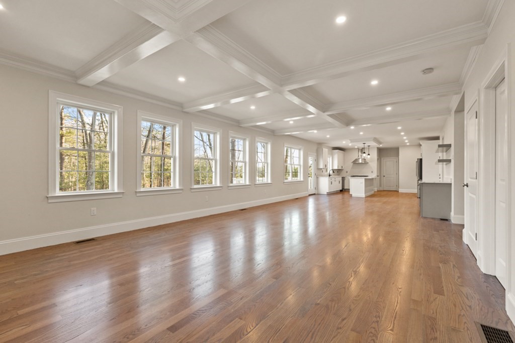 21 Vera Road Middleton, MA 01949 - Photo 11 of 41 a view of an empty room with wooden floor and a window