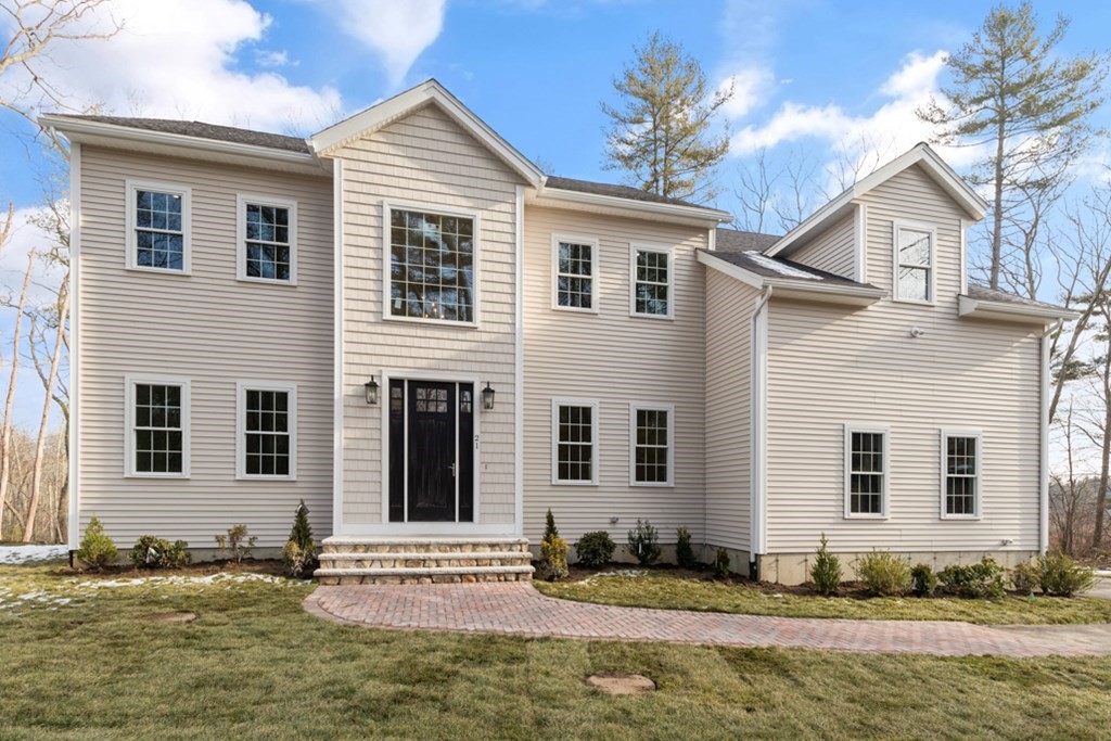21 Vera Road Middleton, MA 01949 - Photo 2 of 41 a front view of a house with a yard